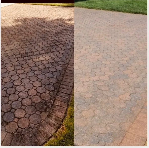 Cobblestone driveway cleaning before and after — dark dirty pavers cleaned to light finish